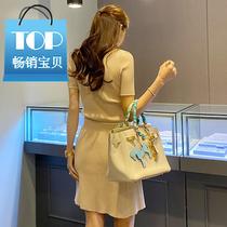 Summer suit female 2020 new Korean fashion small knit shirt top Slim 4 hundred A- shaped half skirt