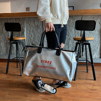 New cowhide large-capacity hand-carrying leather womens bag short-distance travel bag lightweight simple womens bag luggage Tide mens bag