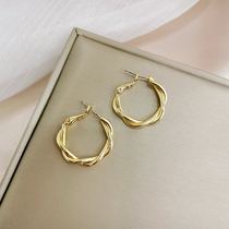 Personality minimalist twist twist numb small earrings South Korean temperament lukewarm design Feminists metal Earrings Circle Earrings