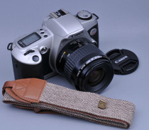Canon EOS Kiss automatic film camera with EF 35-80 lens with wide mode battery