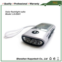 Four in one solar radio flashlight solar charger gift charging treasure solar flashlight
