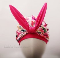 The new fashion is not waterproof the head has long hair and oversized elastic bow rabbit ears sauna swimming cap color