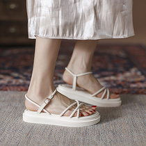 2022 New Korean version 100 hitch student Roman beach shoe pine pastry fairy wind flat bottom thick bottom sandal women summer