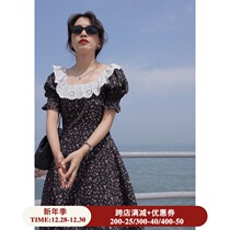 Ouyang Xi square collar lace stitching flower skirt 2021 new summer French retro temperament bubble sleeve dress women
