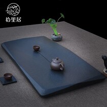 Pick up the whole piece of retro Wujin Stone tea tray Stone tea table Tea Sea handmade home black stone drainage tea