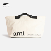 The AMI mens and womens classic designer cotton-oversized lettered cross-body canvas bag