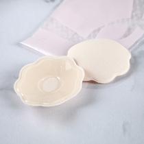 Gold-three-tower knitted cream with a little assistant on the chest.