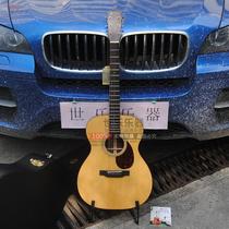 15% off the list price of Martin Martin OM21 full single American acoustic guitar