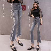 High-waisted tassel hair-edged jeans female Korean temperament celebrities Joker thin elastic nine-point Bell pants autumn