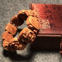 Wild mountain peach core carving means auspicious eight treasures Traditional handmade hand-made hand string bracelet to ward off evil spirits and keep safe