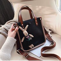 Hong Kong bag womens large capacity soft leather 2021 new versatile portable shoulder messenger solid color cowhide bucket bag tide