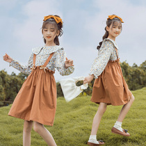  2021 new sweet wind childrens suit girls autumn clothes middle and large childrens childrens floral shirt strap skirt two-piece set