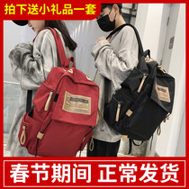 Primary school bag female middle school student junior high school student large capacity backpack male tide cool fashion trend College student backpack