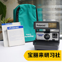 Pauli comes on camera 600 series 2 machines Onestep 600CL close-up with original factory camera bag
