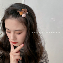 Sichuan wild flocking wool ball grab clip female autumn and winter Net Red new hairclip back head temperament small clip headgear shark clip