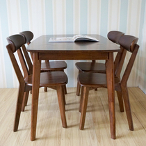 Solid wood dining table and chair combination Modern simple household small apartment rectangular black walnut color dining table Nordic dining table