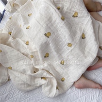 voila Organic Cotton Gauze Baby Swadd Baby is covered by Danish in the wind