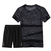 Summer Sports Suit Men Short Sleeve Shorts Sportswear LOOSE BIG CODE RUNNING FITNESS SUIT ROUND COLLAR T-SHIRT TWO SETS
