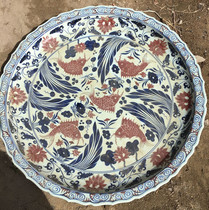 A large plate with a red koi pattern one meter in diameter in the blue and white glaze of old porcelain in the Ming and Qing Dynasties