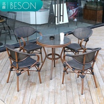 Outdoor table and chairs Terrace Patio Milk Tea Shop Outside Swing Casual Room Outside waterproof chair Composition Balcony Rattan chair Three sets