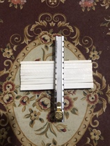 A common talc pen clip and ten talc pencil caps