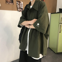 Small daisy embroidered short-sleeved shirt mens thin summer Korean version of the trend ruffian handsome jacket Port wind Japanese loose shirt