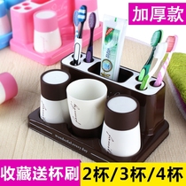 A family of three wash kit cups placed in the bathroom couple brushing mouthwash cups four toothpaste toothbrush rack