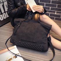Hong Kong Chao brand 2021 new fashion leather women's bag frosted rivet tassel portable bag shoulder messenger bag tide