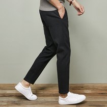 Woolen pants mens winter thickened Korean version of the trend of slim feet pants mens casual pants all-match black nine points