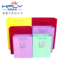 Spring Festival New Year fashion personality solid color gift bag packaging bag for clothes portable Korean bag vertical gift bag