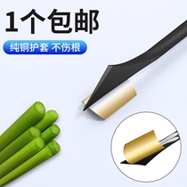 A tool for the extraction of garlic tunes with garlic tunes to harvest the dethezer to draw and pick up the garlic bolds for the harvesting of the garlic and the garlic tucked