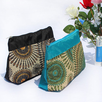 Hollow through flower sun flower womens bag cosmetic bag storage bag washing bag tool bag European and American fashion classical noble