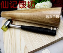 Simple manual repair of the garden gold and silver ring bracelet with gold and silver tool rubber hammer wood garden stick