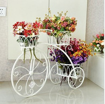 European style new iron iron balcony model plant rack indoor and outdoor bicycle flowerpot bonsai flower rack spot