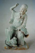 Yuan egg white glaze porcelain carved Fuhu Luohan statue
