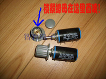 A pair of domestic 10K10 circular coil coils ( with a pair of large copper core knobs )
