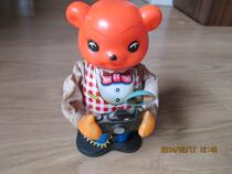 Nostalgic old tin bear photo toy