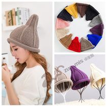 Explosion style Japan and South Korea men and women wool hats students wild warm knitted pointy hat Crimped pacifier hat Ear protection adult