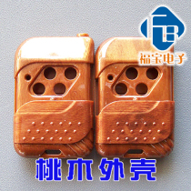 Garage door remote control rolling door remote control retractable door electric door remote control housing peach wood four-key housing