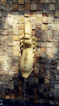 Sandstone sculpture small fish spray water garden landscape wall hanging play water long flow water landscape nozzle spray water round carving courtyard water scene