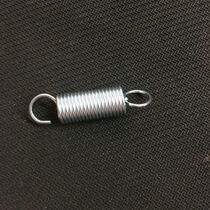 Baler knife spring