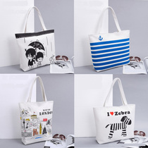2015 Womens bag Canvas bag Womens shoulder bag fashion Korean version portable large bag Student bag fashion shopping bag