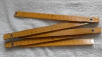 Wooden folding ruler from the 70s and 80s. The goods in the gallery are relatively new and old. The objects are of good quality. The collection is old.
