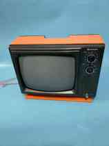 The old - fashioned 12 - inch brand black and white TV in the 70 - 80s