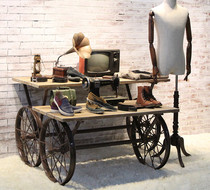 Wrought iron clothing display rack window design display cabinet clothing store wheel running water table retro solid wood floor shelf