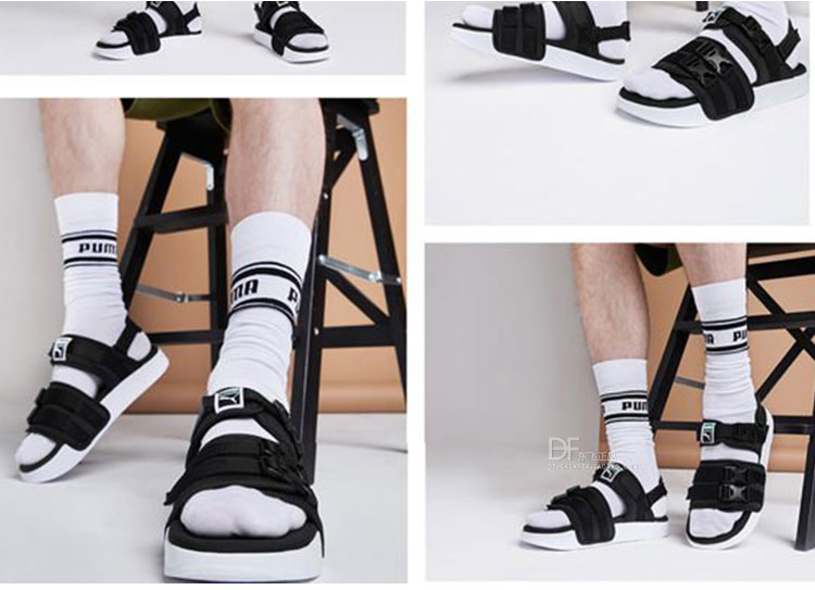 Puma Hummer mùa hè mới dán ma thuật giày bãi biển đen và trắng xanh nam giới và phụ nữ dép thể thao 365630-01-06 dép quai hậu nam 2021