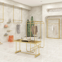 Clothing store display rack on the wall stainless steel titanium gold wall hanging clothes rack womens clothing store display flow table shelf