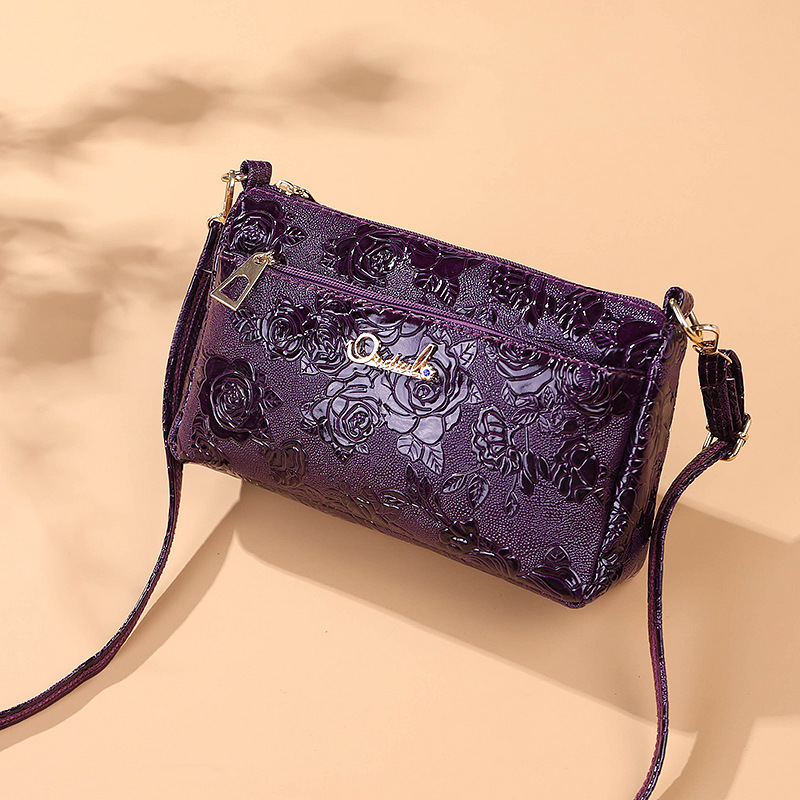 Women's bag 2022 Summer Korean version lacquered leather New single shoulder inclined satchel bag for the mother to buy the vegetable packet bag