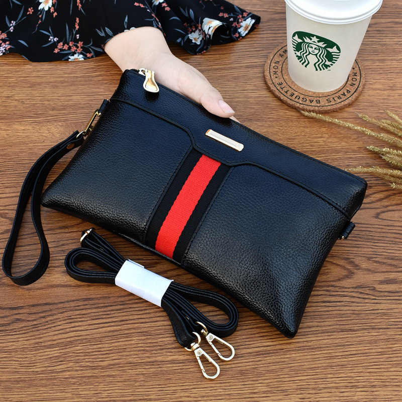 2020 new contrast striped shoulder messenger bag European and American fashion clutch bag ladies temperament mobile phone bag large capacity