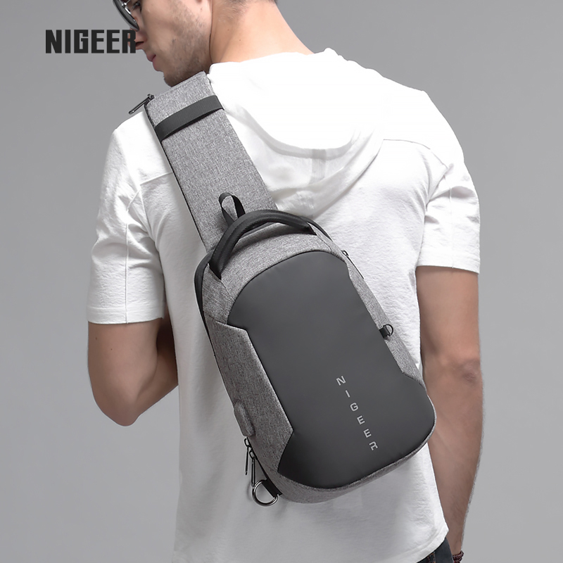 Chest Bag Male Tide Card Single Shoulder Bag Slanted Satchel Bag men's bag Han version Leisure Multi-functional student Italics cross small scapegoat